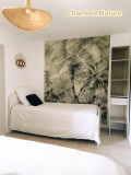 Chambre 1 Lit 160 x 200 et lit 90 x 200. Placard penderie - © Propriétaire Aline Buchaillard Chambre 1 Lit 160 x 200 et lit 90 x 200. Placard penderie