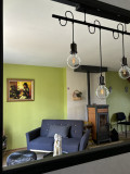 VUE SALON POELE DE L'ENTREE